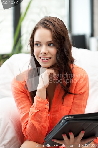 Image of happy woman with tablet pc computer