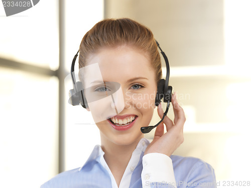 Image of friendly female helpline operator