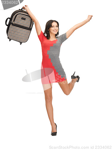 Image of lovely woman with suitcase