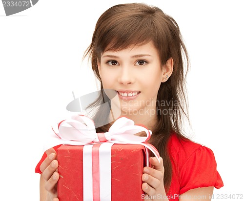 Image of happy teenage girl with gift box