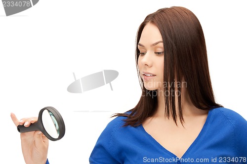 Image of woman with magnifying glass