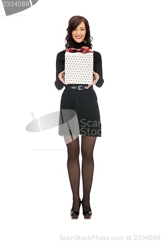 Image of lovely woman with gift box