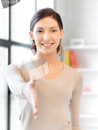 Image of woman with an open hand ready for handshake