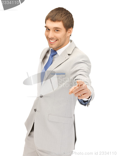 Image of businessman pointing his finger