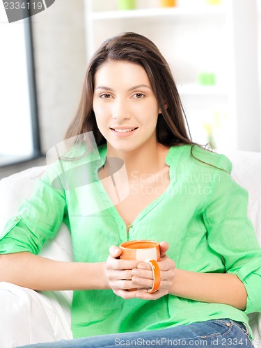 Image of lovely woman with mug