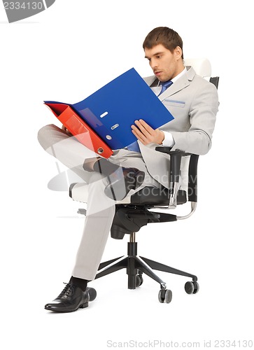 Image of man with folders