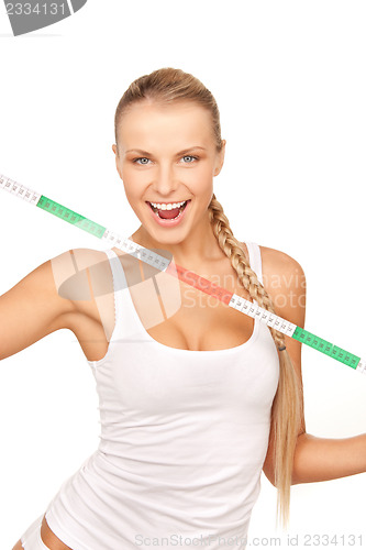 Image of young beautiful woman with measure tape