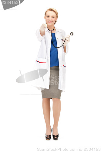 Image of attractive female doctor pointing her finger