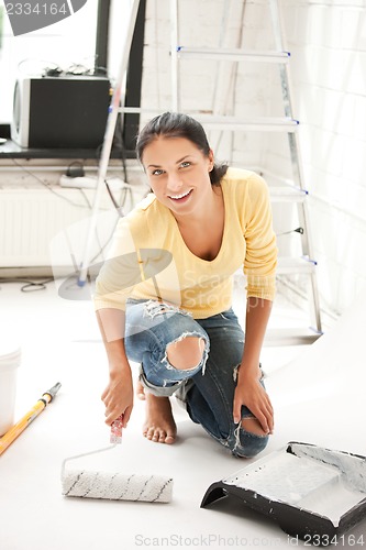 Image of lovely housewife painting