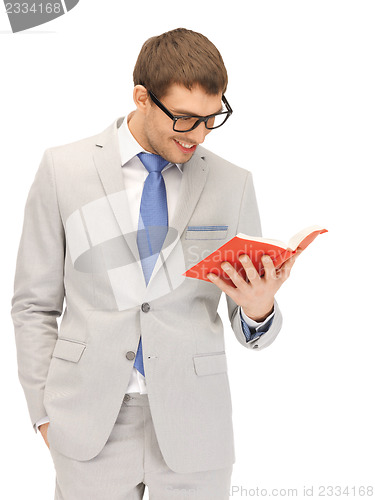 Image of happy man with book