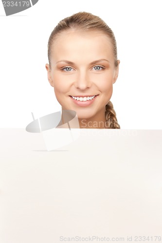 Image of woman with blank board