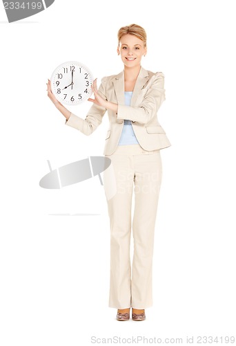 Image of woman holding big clock