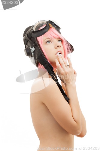 Image of topless pink hair girl in aviator helmet