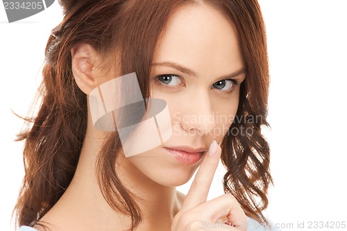 Image of finger on lips