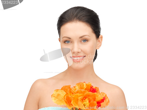 Image of lovely woman with red flowers