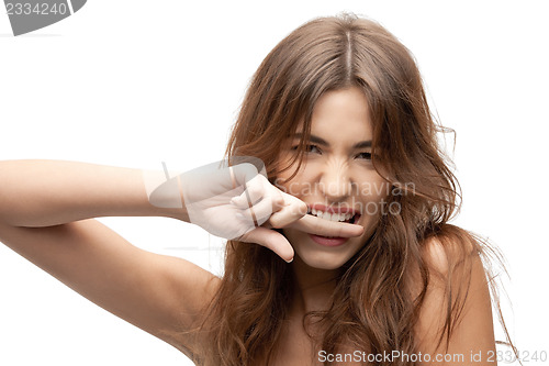 Image of woman biting her finger