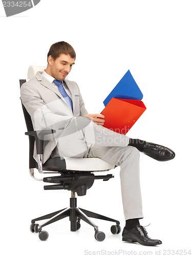 Image of man with folders