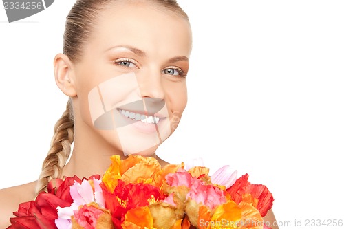 Image of lovely woman with red flowers