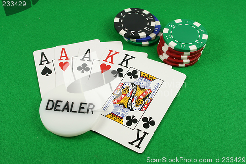 Image of Full House with a dealer chip on top