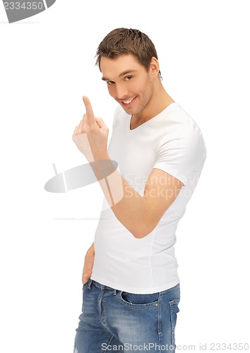 Image of man in white shirt making inviting gesture