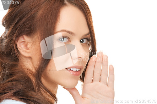 Image of woman whispering gossip