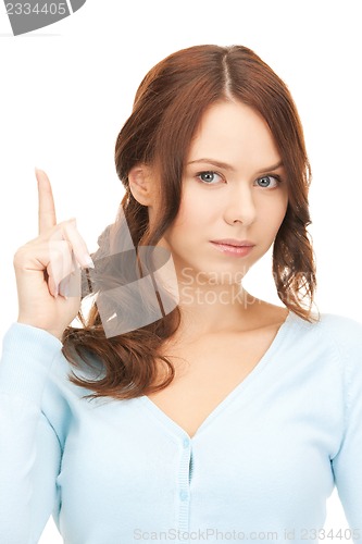 Image of woman with her finger up