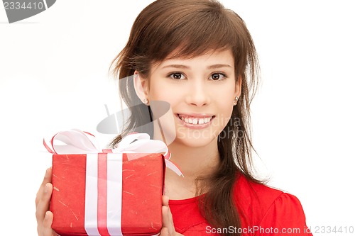 Image of happy teenage girl with gift box