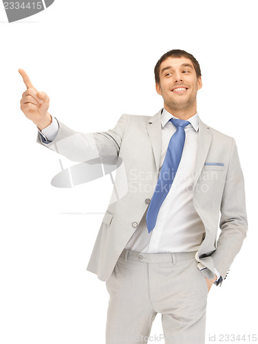 Image of businessman pointing his finger