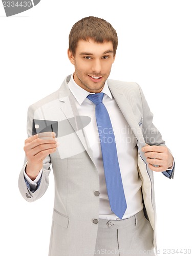 Image of businessman with credit card