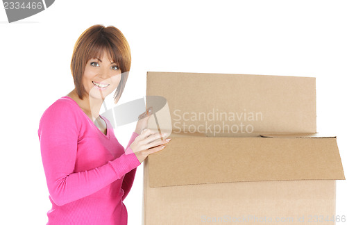 Image of attractive businesswoman with cardboard box