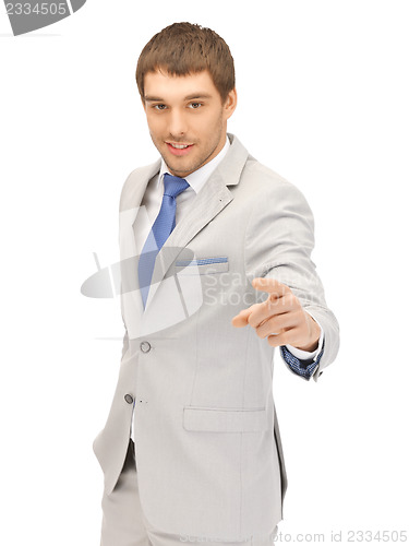 Image of businessman pointing his finger