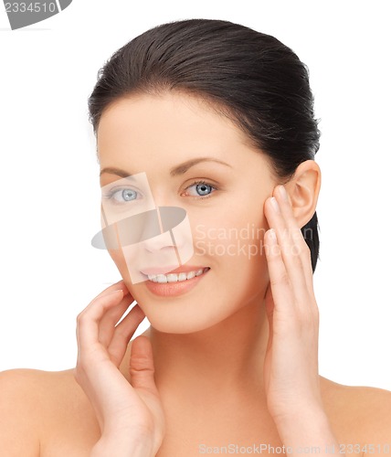 Image of face and hands of beautiful woman