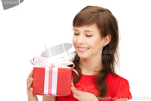 Image of happy teenage girl with gift box