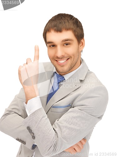 Image of businessman pointing his finger