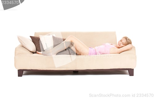 Image of sleeping woman on sofa