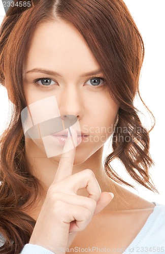 Image of finger on lips