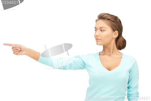 Image of businesswoman pointing her finger