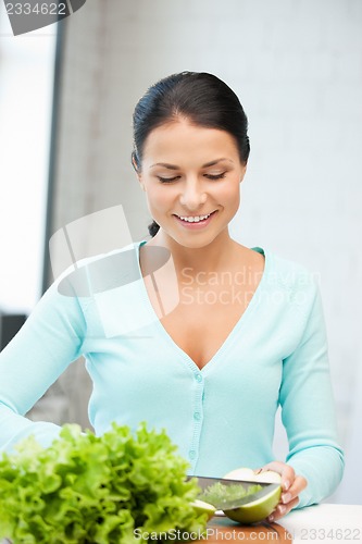 Image of beautiful woman in the kitchen