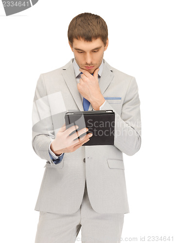 Image of calm man with tablet pc computer