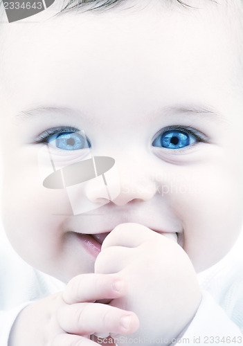 Image of adorable baby with blue eyes