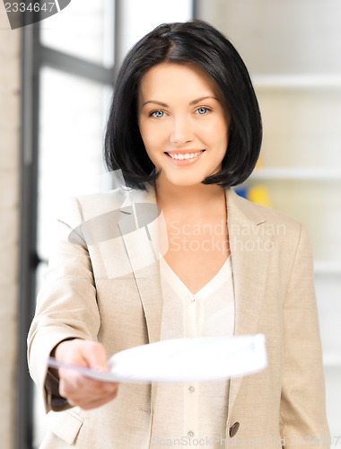 Image of happy woman with documents