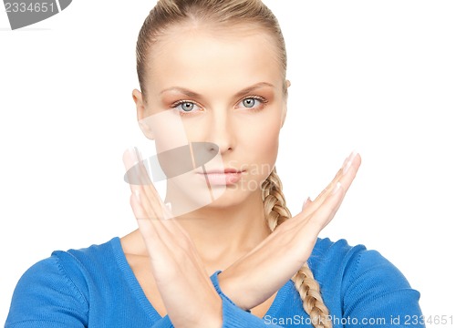 Image of woman making stop gesture