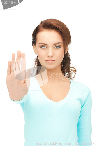 Image of woman making stop gesture