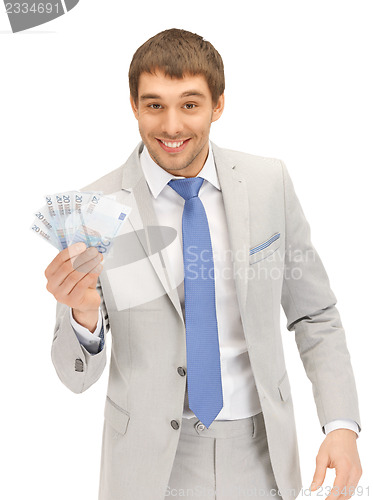 Image of handsome man with euro cash money