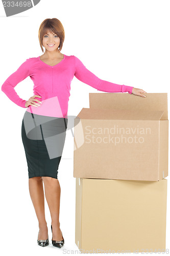 Image of attractive businesswoman with big boxes