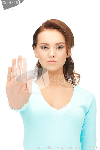 Image of woman making stop gesture