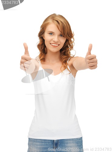 Image of teenage girl in blank white t-shirt with thumbs up