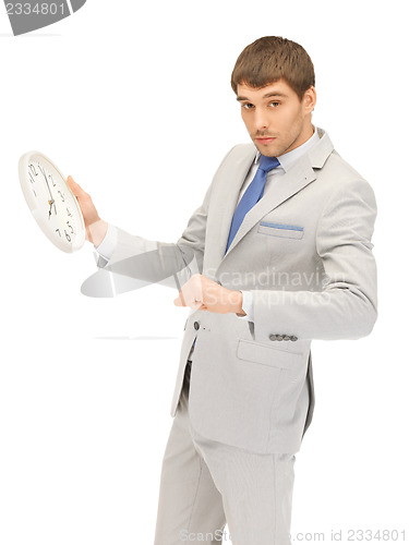 Image of man with clock