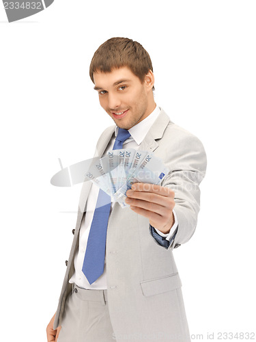 Image of handsome man with euro cash money