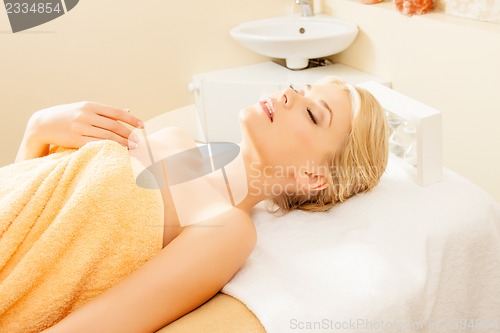 Image of beautiful woman in spa salon